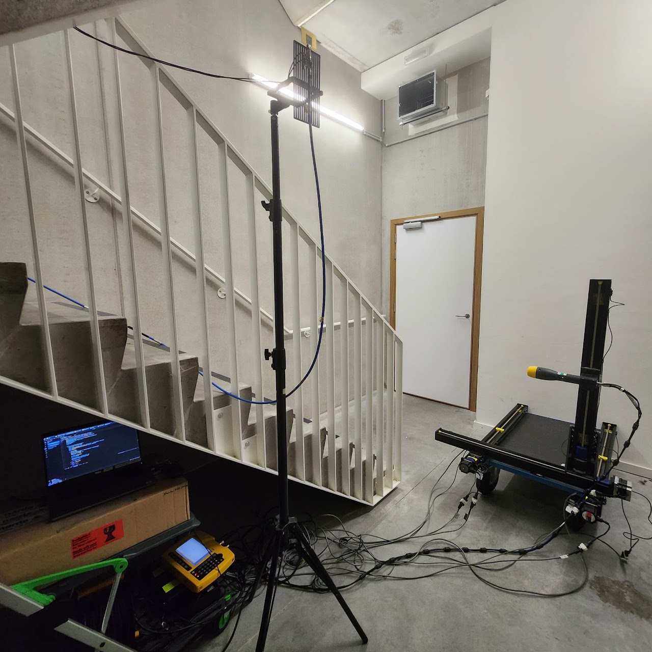 Robotic electric-field measurements in a room at 28 GHz