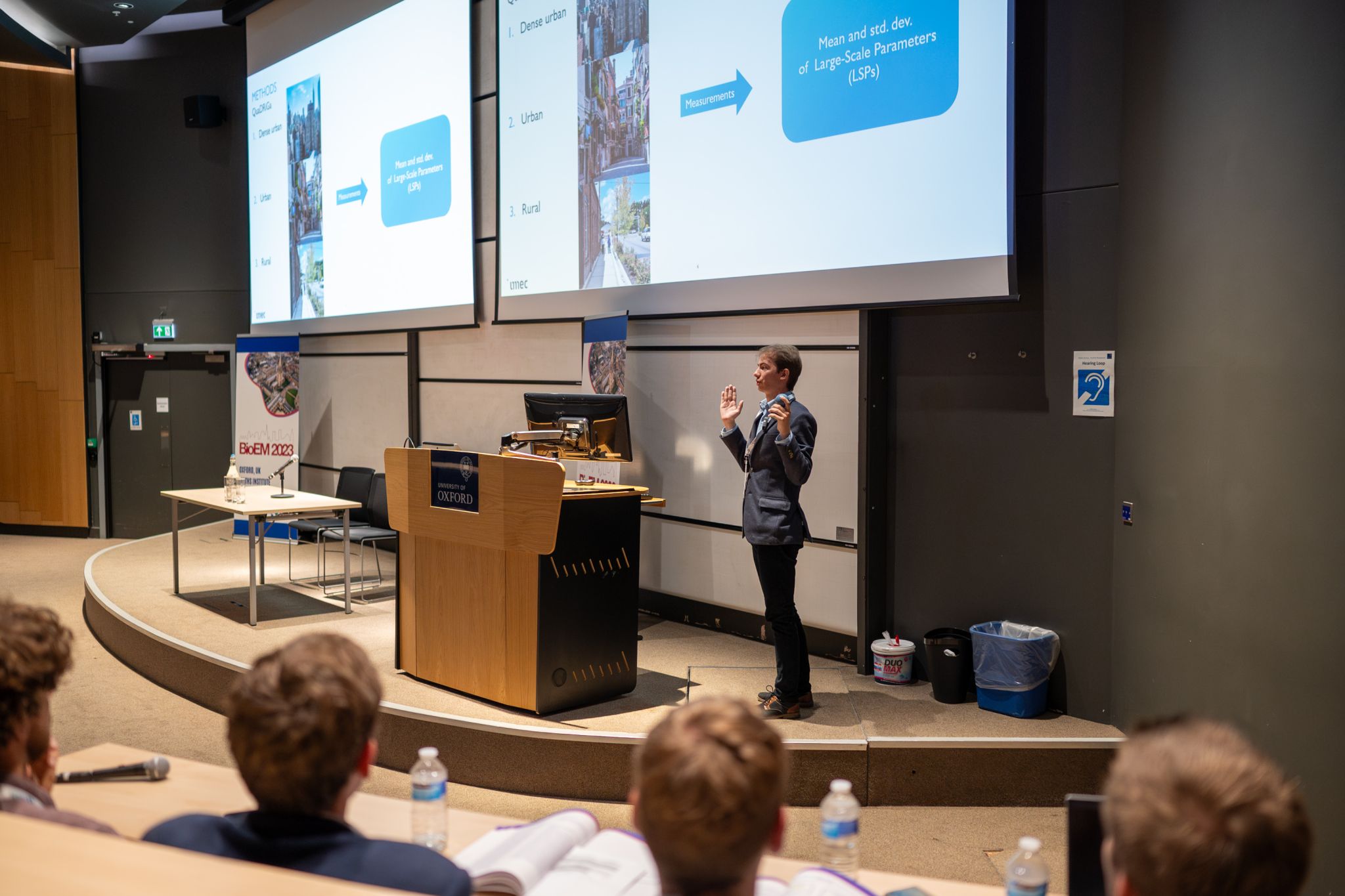 Robin presenting research in a lecture theatre